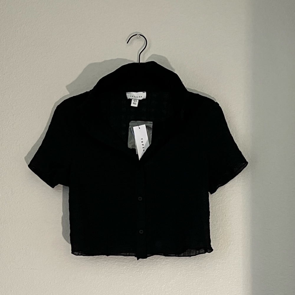 Button up black comes with back up buttons